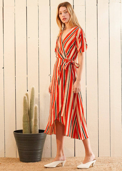 Lemon Hera puff sleeve wrap dress in Poppy Multi with vibrant floral pattern, fitted waist, and flowing skirt.