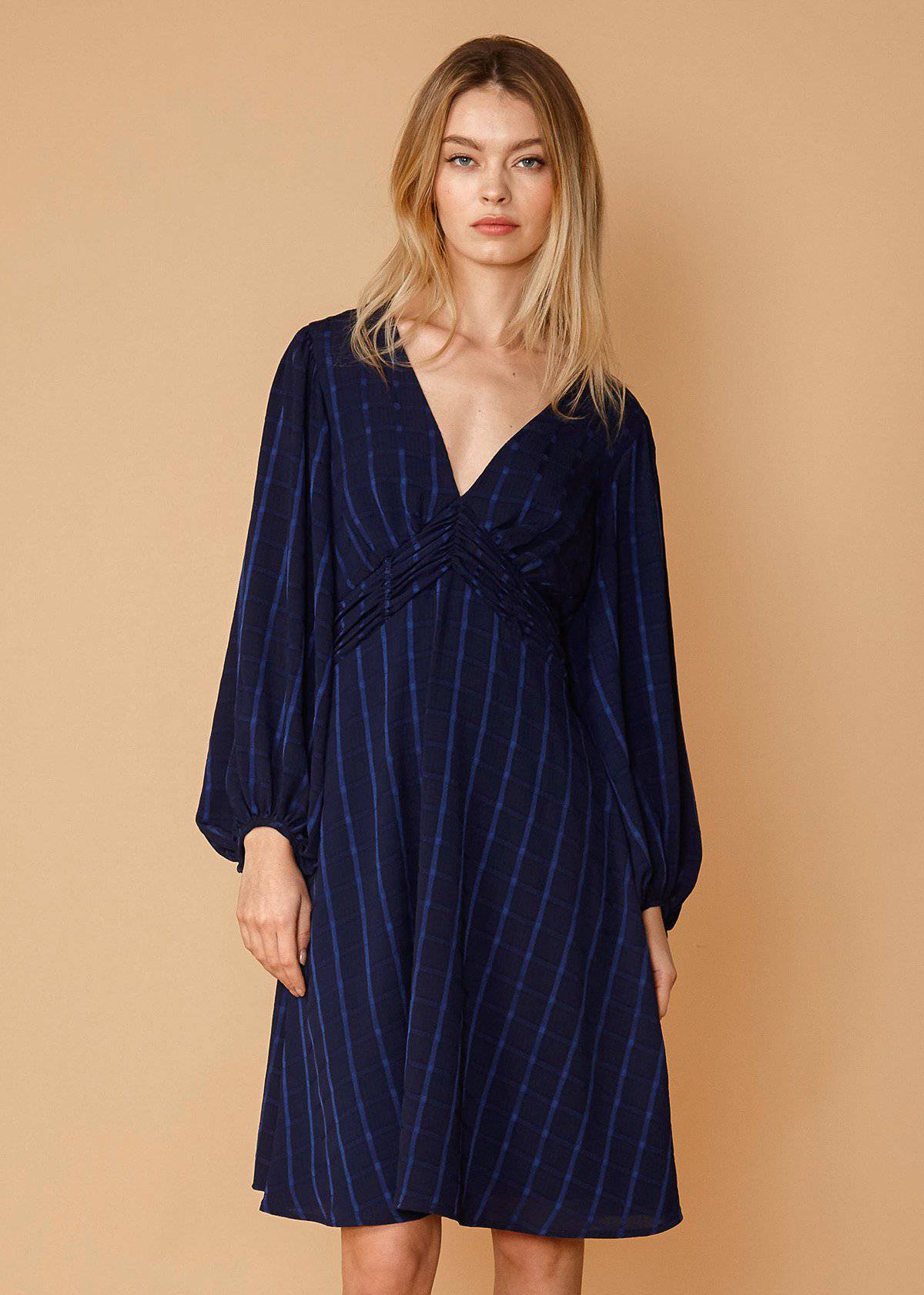 V-neck checkered dress in night plaid by Lemon Hera, featuring a stylish pattern and a comfortable fit.