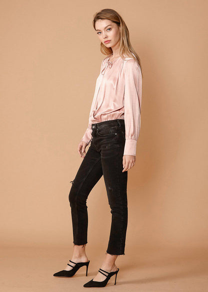 Lemon Hera fall pink tie-neck long sleeve bodysuit, close-up of stylish neckline and fitted long sleeves.
