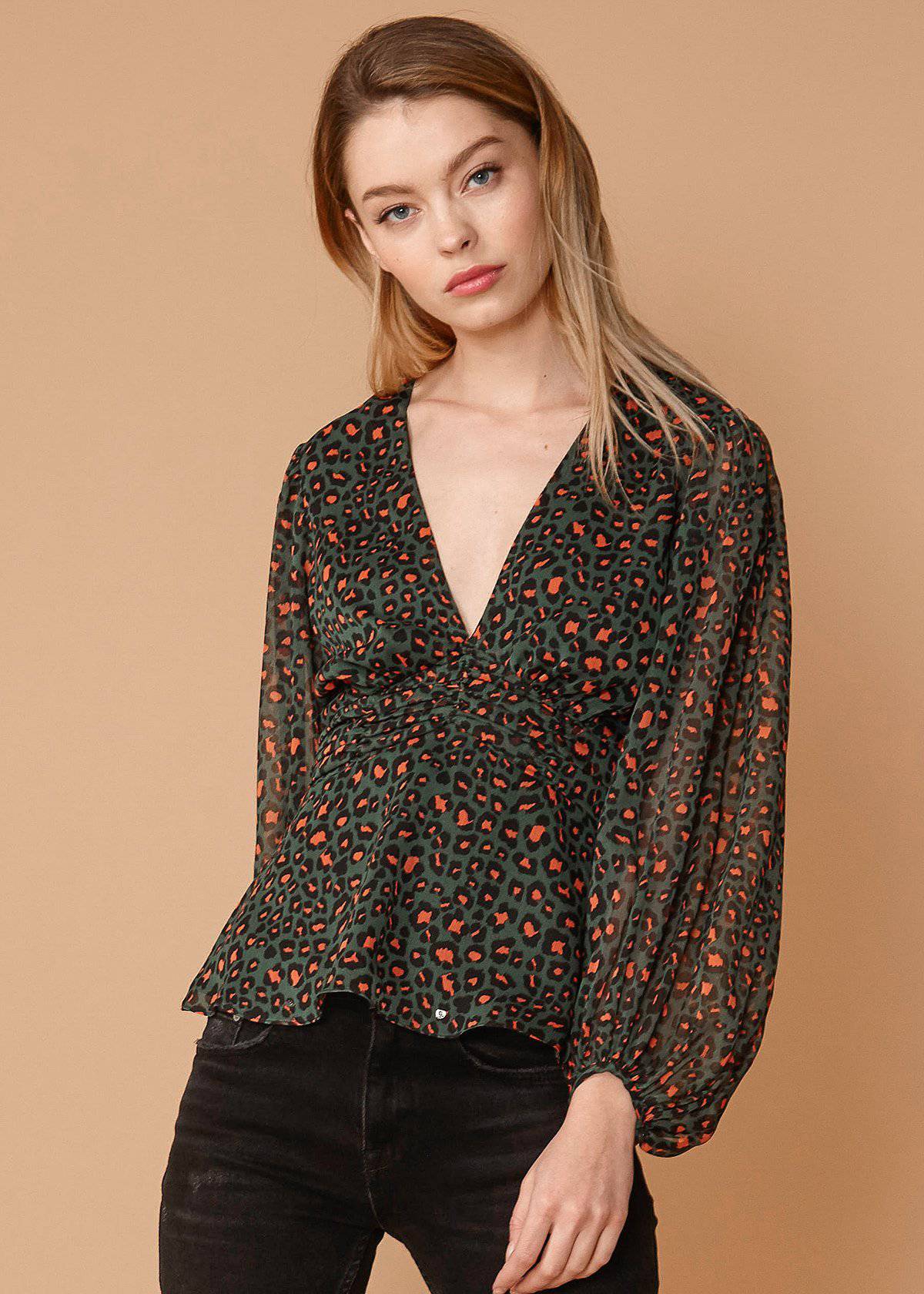 Leopard print V-neck puff sleeve blouse by Lemon Hera, stylish tops and blouses, featuring a fitted V-neck design and voluminous sleeves.