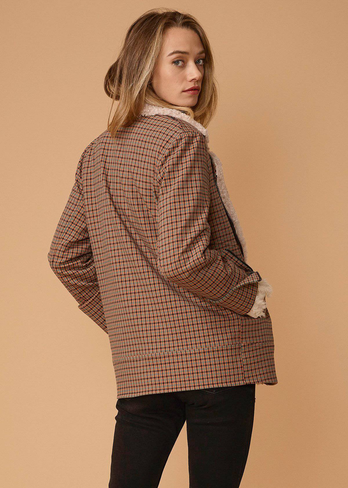 Lemon Hera asymmetrical zip front coat in peach gingham fabric, stylish jacket with unique design and front zipper detail.