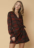 Lemon Hera plaid and polka dot mini wrap dress in brick color, featuring long sleeves and a fitted waist.