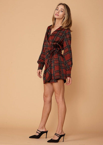 Lemon Hera plaid and polka dot mini wrap dress in brick color, featuring a stylish silhouette and short sleeves.