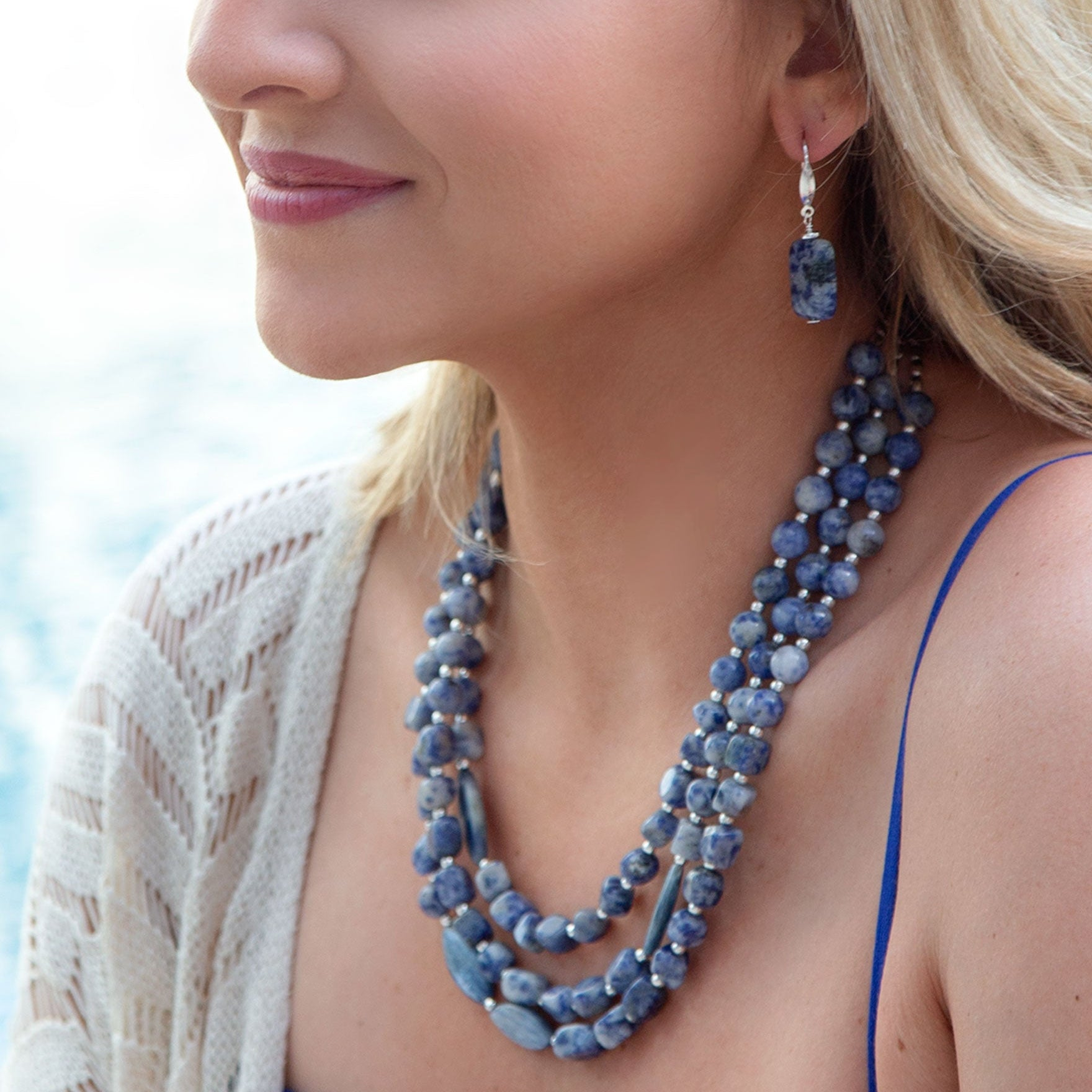 Denim blue quartz silver drop earrings from Start2Finish jewelry, featuring teardrop-shaped blue quartz stones on silver hooks.