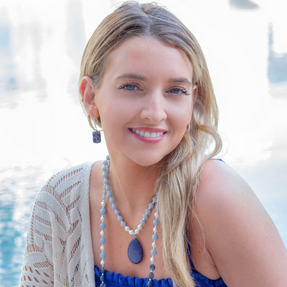 Denim blue quartz silver drop earrings featuring elegant jewelry design with silver hooks and vibrant blue gemstone accents.