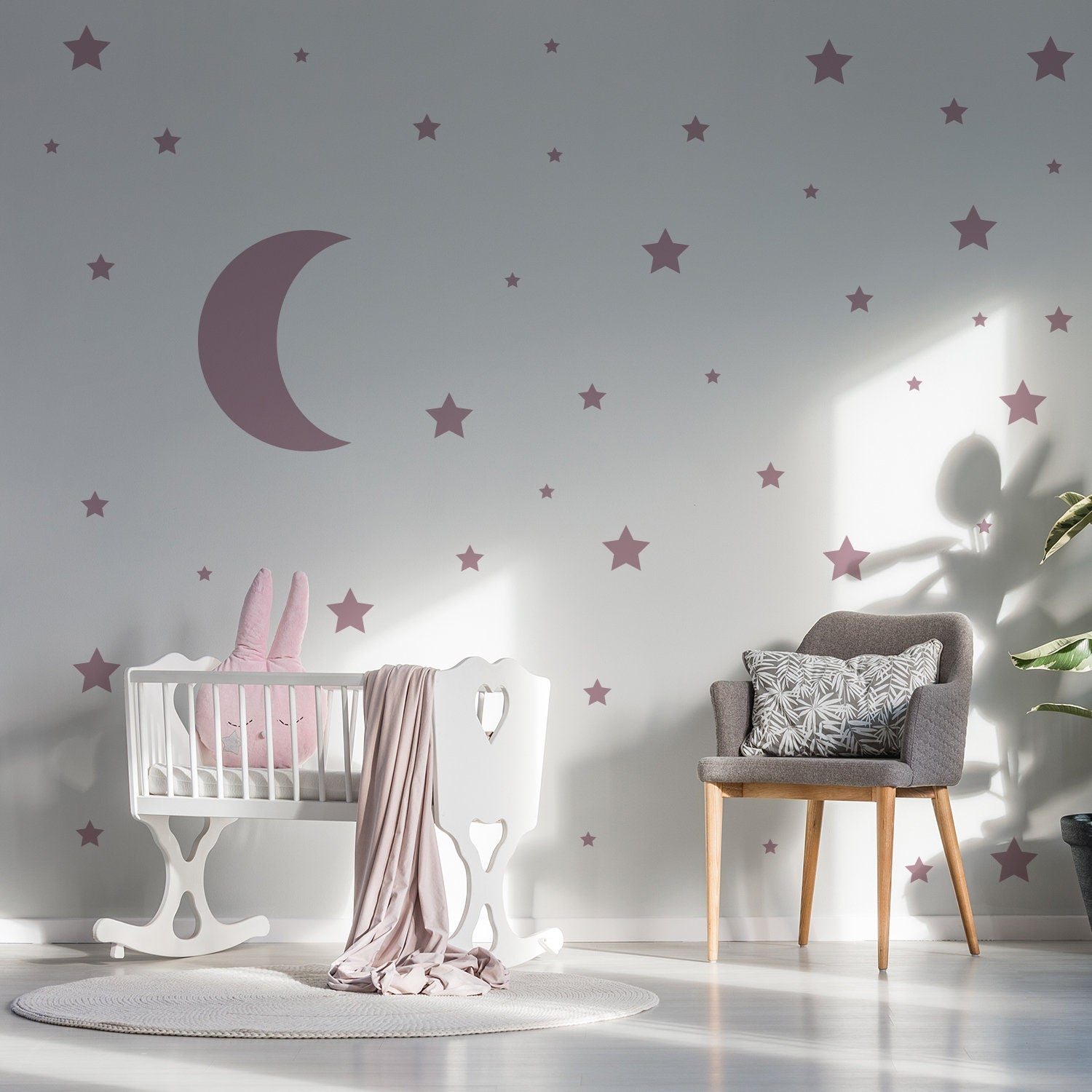 Gold crescent moon wall sticker set featuring 115 star decals for nursery decor, perfect for baby shower or bedroom decoration.
