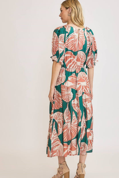Full-size printed notched puff sleeve midi dress by Umgee, featuring a stylish automotive-inspired design.