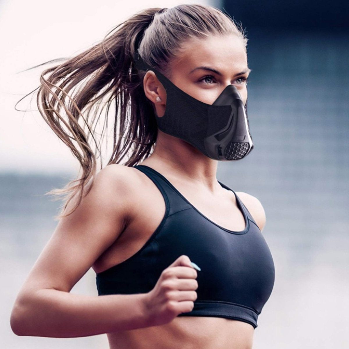 Salmon Lucky elevation resistance training cardio sports mask with adjustable straps and breathable fabric, designed for workout enhancement.