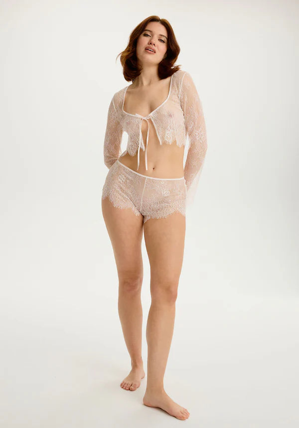 Start2Finish blush sheer eyelash lace crop top in serene bisque color, featuring delicate lace details and a fitted style.