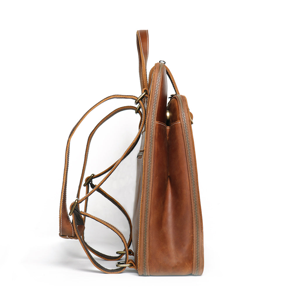Start2Finish Sachi leather backpack for women, small stylish brown leather accessory with adjustable straps and front pocket.