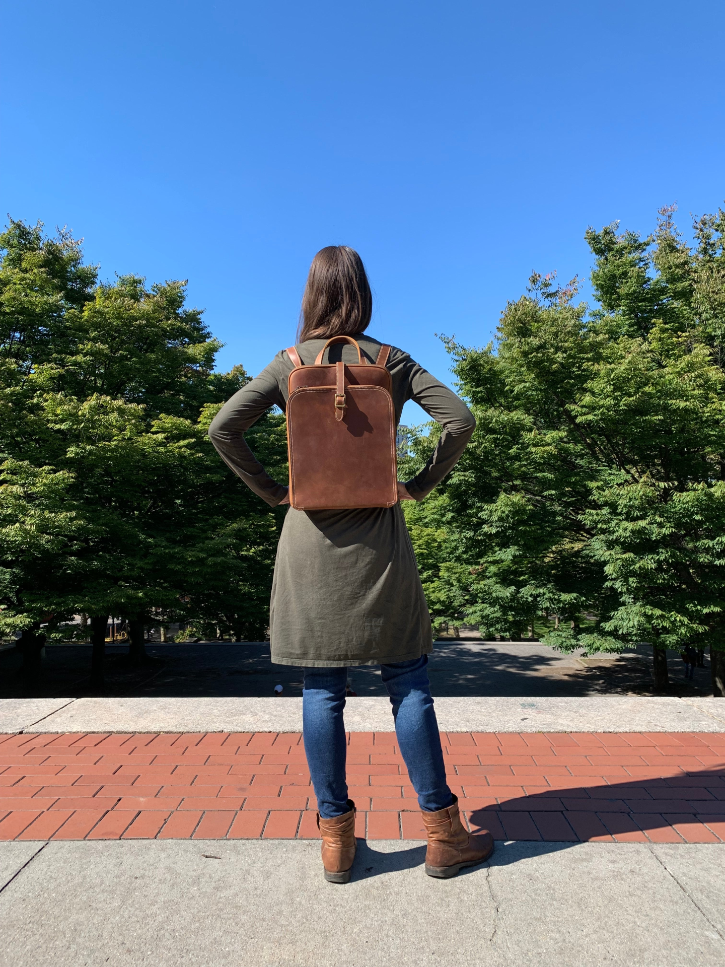 Start2Finish Sachi leather backpack for women, small stylish leather accessory with adjustable straps and top handle.