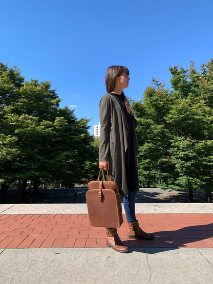 Start2Finish Sachi Leather Backpack for women, small stylish leather accessory with adjustable straps and top handle.