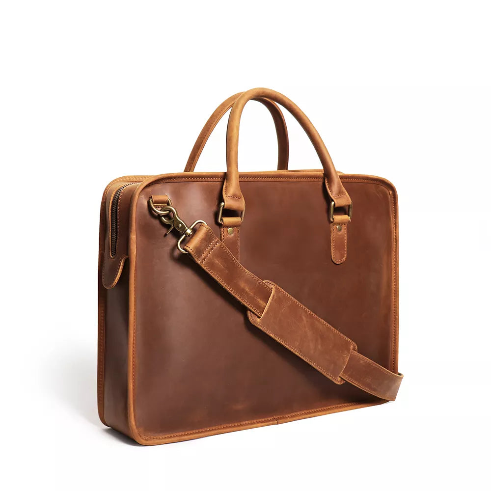 Hemming Leather Laptop Bag by Start2Finish, vintage leather briefcase with sturdy handles and sleek design for accessories.