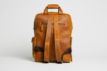 Large capacity leather camera backpack from Start2Finish, designed for accessories, with multiple compartments and adjustable straps.