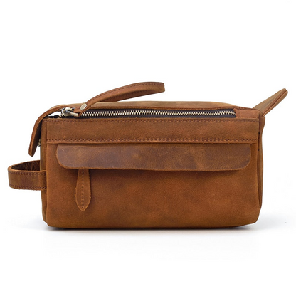 Handmade leather Dado Leather Dopp Kit toiletry bag with sturdy leather strap and spacious interior, designed for travel accessories.