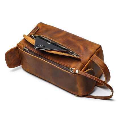 Handmade leather Dado Dopp Kit toiletry bag by Start2Finish, featuring a compact leather accessories bag with sturdy zipper closure.
