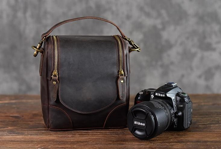 Small leather camera bag from Start2Finish, designed to hold camera lenses and accessories with a compact, stylish leather case.
