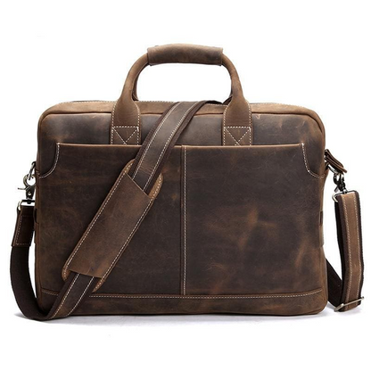 Vintage leather Welch Briefcase by Start2Finish, classic messenger bag with sturdy leather strap and spacious interior for accessories.