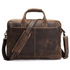 Vintage leather Welch Briefcase by Start2Finish, classic messenger bag with sturdy leather strap and spacious interior for accessories.