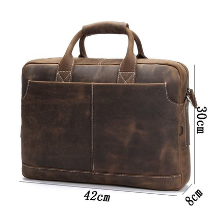 Vintage leather messenger bag from The Welch Briefcase collection, stylish Start2Finish accessories with sturdy leather straps and classic design.