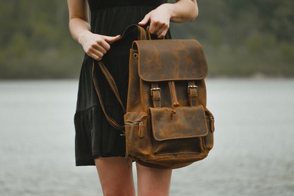Vintage leather Hagen backpack by Start2Finish with adjustable straps and classic design, shown from the front view.