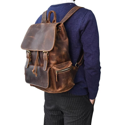 Vintage leather Hagen backpack by Start2Finish, showcasing durable leather straps and spacious compartments for everyday accessories.