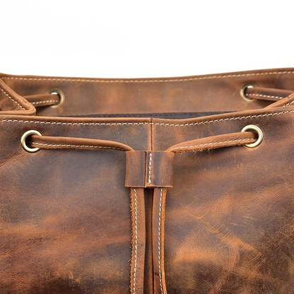 Vintage leather Hagen backpack by Start2Finish, featuring adjustable straps and spacious main compartment.