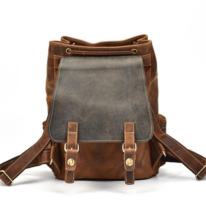Vintage leather Hagen backpack by Start2Finish, featuring sturdy straps and a spacious main compartment in a classic accessory style.