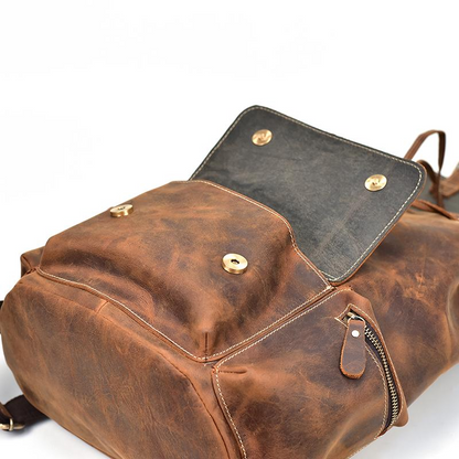Start2Finish Hagen vintage leather backpack, showing adjustable shoulder straps, front pocket, and classic leather finish.