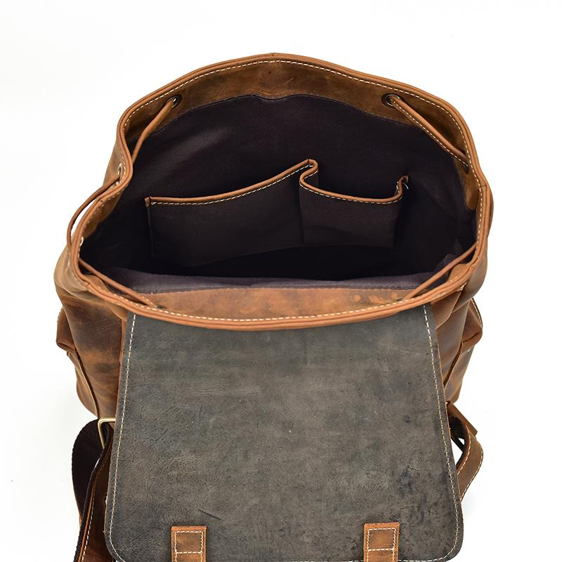 Vintage leather Hagen backpack by Start2Finish, featuring durable leather straps and classic accessory design.