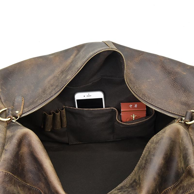 Start2Finish Colden Duffle Bag with large capacity leather weekender, showing sturdy handles and spacious interior for travel accessories.