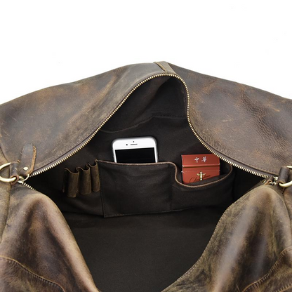 Start2Finish Colden Duffle Bag with large capacity leather weekender, showing sturdy handles and spacious interior for travel accessories.
