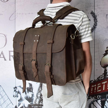 Start2Finish Gustav large vintage leather messenger bag showing front view with adjustable strap and spacious design.