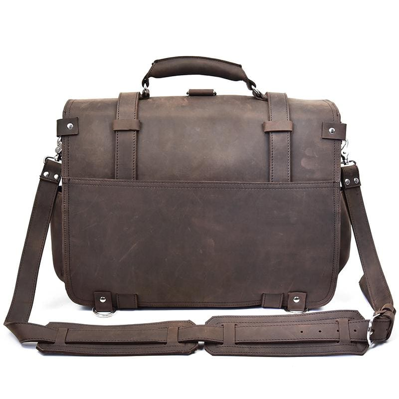 Vintage leather Gustav Messenger Bag by Start2Finish with large capacity, featuring adjustable strap and classic accessory design.