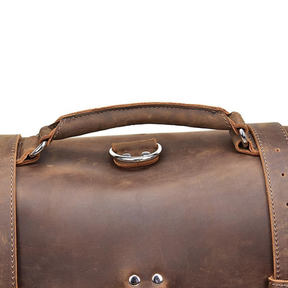Start2Finish Gustav vintage leather messenger bag with large capacity, featuring adjustable strap and classic accessory design.