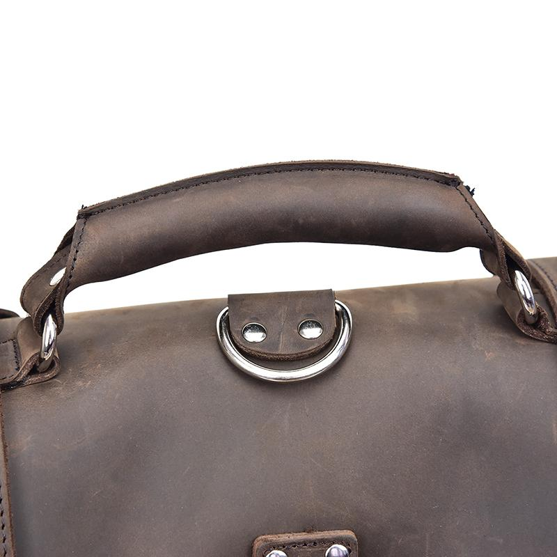 Large vintage leather messenger bag from Start2Finish with a spacious design, adjustable strap, and classic accessory style.