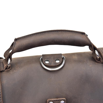 Large vintage leather messenger bag from Start2Finish with a spacious design, adjustable strap, and classic accessory style.