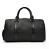 Vintage leather duffle bag from Start2Finish, The Endre Weekender, with sturdy handles and classic design for travel accessories.