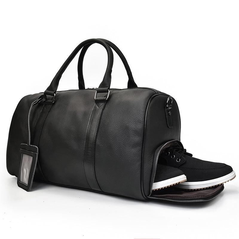 Vintage leather duffle bag from Start2Finish, The Endre Weekender, featuring sturdy handles and spacious interior for travel accessories.