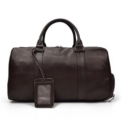 Start2Finish Endre Weekender vintage leather duffle bag with sturdy handles, side pockets, and classic leather finish.