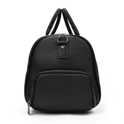 Start2Finish Endre Weekender vintage leather duffle bag with sturdy handles and spacious interior for travel accessories.