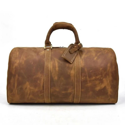 Start2Finish Bjarke Weekender leather duffle bag with sturdy handles and polished finish, designed for stylish travel accessories.