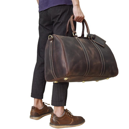 Start2Finish Bjarke Weekender leather duffle bag showing its handcrafted leather exterior and spacious design for travel accessories.