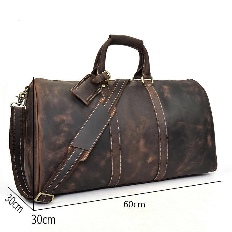 Handcrafted leather duffle bag from the Bjarke Weekender collection by Start2Finish, showing sturdy leather handles and spacious design.