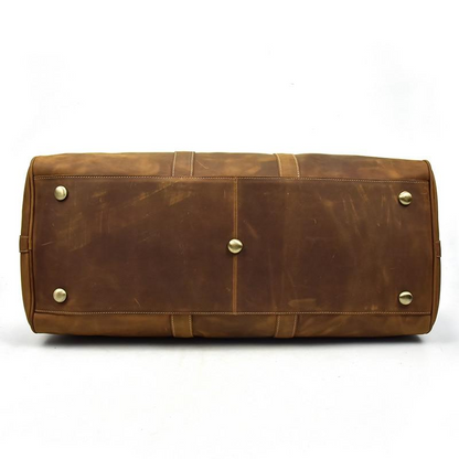 Start2Finish Bjarke Weekender handcrafted leather duffle bag with sturdy handles and spacious interior for travel accessories.