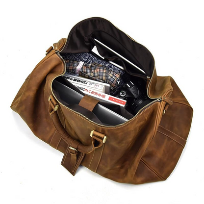 Start2Finish Bjarke Weekender handcrafted leather duffle bag showing sturdy handles and spacious main compartment.