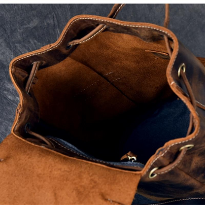 Vintage leather Olaf Rucksack by Start2Finish, a stylish travel backpack with adjustable straps and multiple compartments.