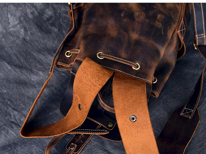 Vintage leather Olaf Rucksack by Start2Finish, a stylish travel backpack with sturdy straps and classic design, perfect for accessories.