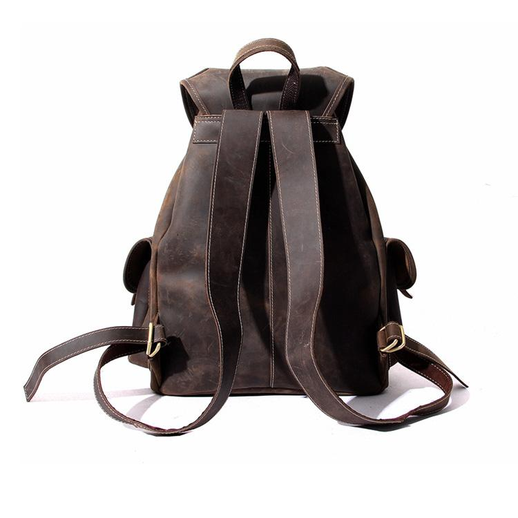 Start2Finish The Asmund genuine leather backpack, a stylish rucksack with adjustable straps and multiple compartments.