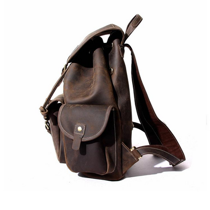 Start2Finish The Asmund genuine leather backpack, a stylish rucksack with adjustable straps and multiple compartments.